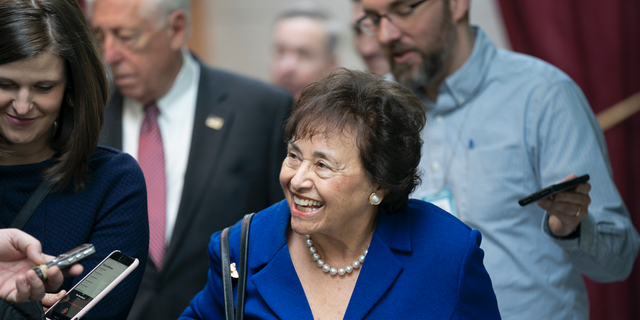 In this Feb. 6, 2019, photo House Appropriations Committee Chair Nita Lowey, D-N.Y., head of the bipartisan group of House and Senate bargainers trying to negotiate a border security compromise in hope of avoiding another government shutdown, walks with reporters to a Democratic Caucus on Capitol Hill in Washington. Lowey announced Thursday she would not seek another term.