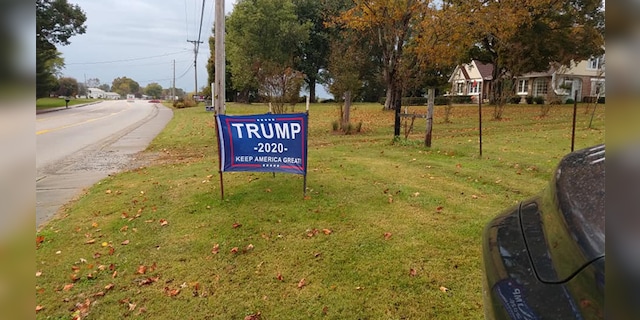 Powell said his other signs had been cut, but he sewed them back together and reinstalled them on his property.