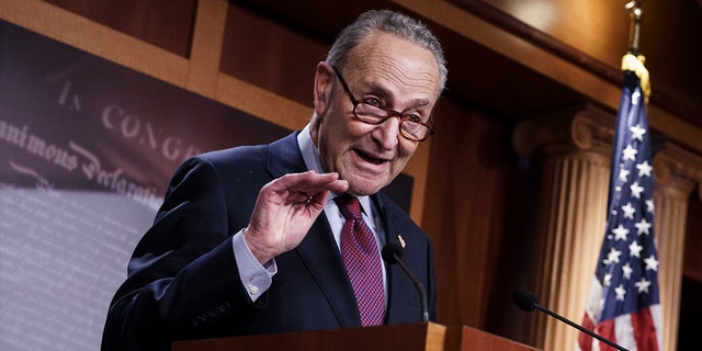 Senate Majority Leader Chuck Schumer, D-N.Y., praises his Democratic Caucus at a news conference just after the Senate narrowly approved a $1.9 trillion COVID-19 relief bill, at the Capitol in Washington, Saturday, March 6, 2021. Senate passage sets up final congressional approval by the House next week so lawmakers can send it to President Joe Biden for his signature. (AP Photo/J. Scott Applewhite)